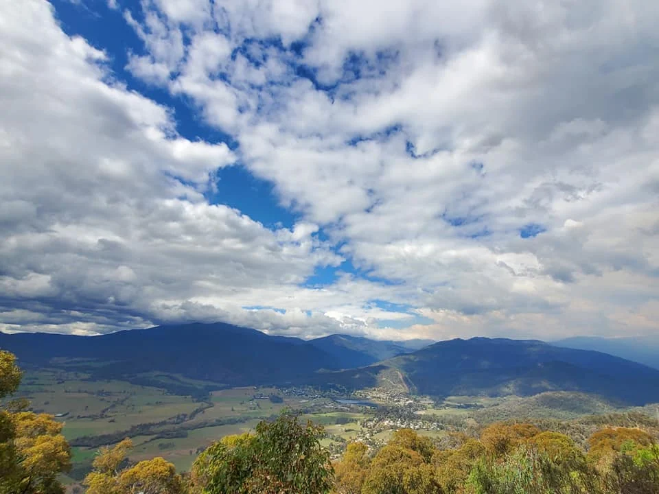 Mountain and valley views at Mount Beauty beneath a cloudy sky